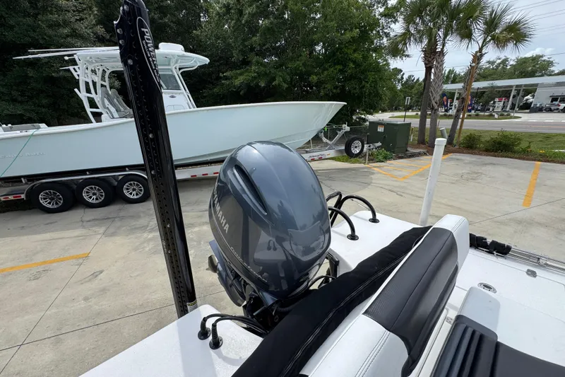 Slide: The Image of 2021 Blazer Bay 2220 GTS boat with Yamaha outboard motor in a parking lot. - 34