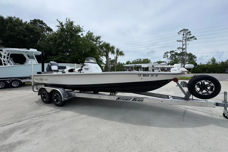 Slide: The Image of 2021 Blazer Bay 2220 GTS boat on trailer, parked outdoors. - 7