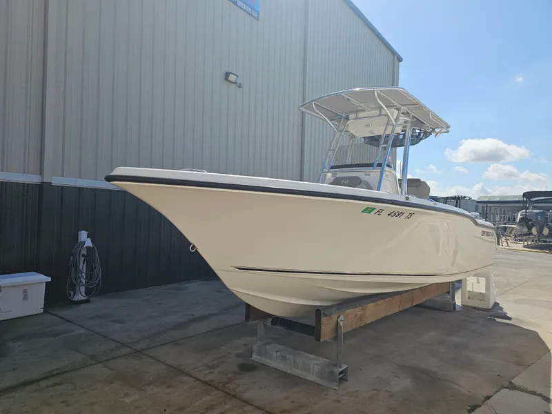 The Image of 2024 Key West 239 FS boat on a dock under sunny skies. - 0