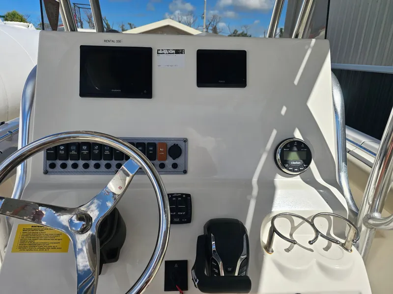 Slide: The Image of Dashboard of Key West 239 FS boat, model year 2024. - 16