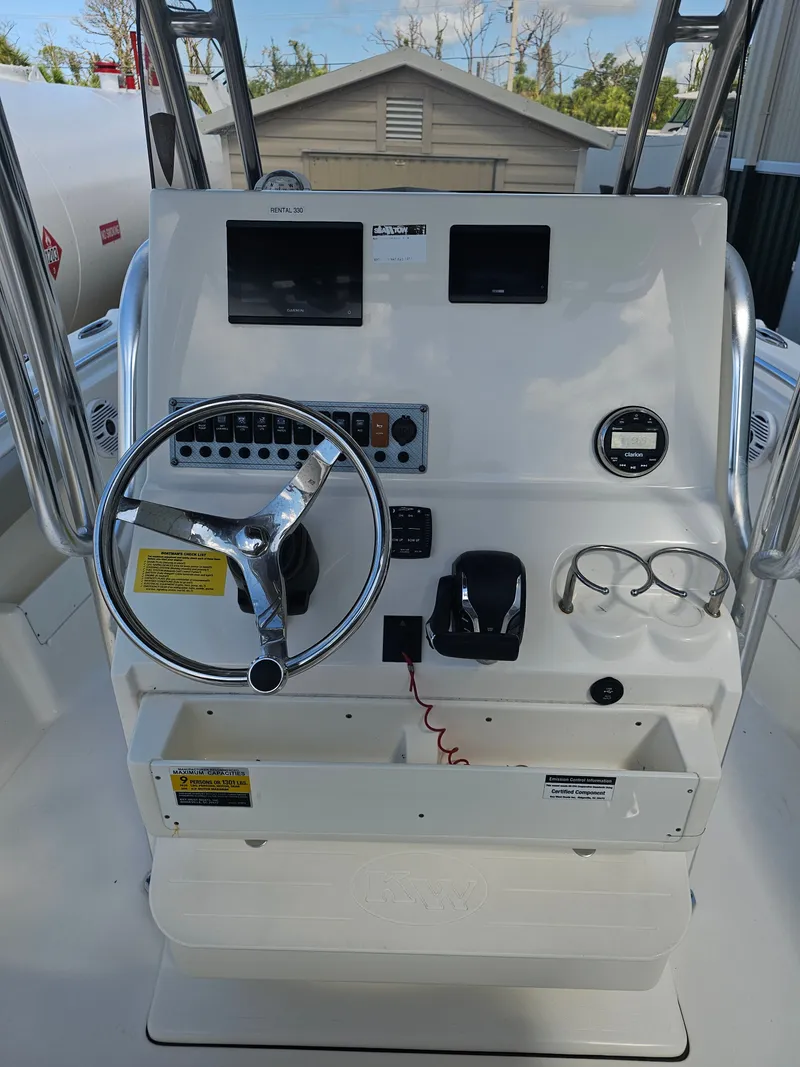 Slide: The Image of Helm console of a 2024 Key West 239 FS boat. - 19