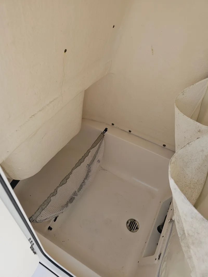 Slide: The Image of Interior of 2024 Key West 239 FS boat with storage area. - 20