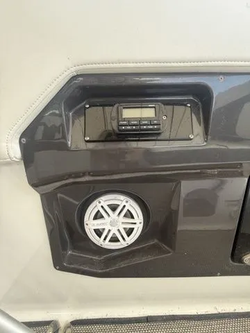 Slide: The Image of Monterey 258SS 2019 boat console with speaker and controls. - 11