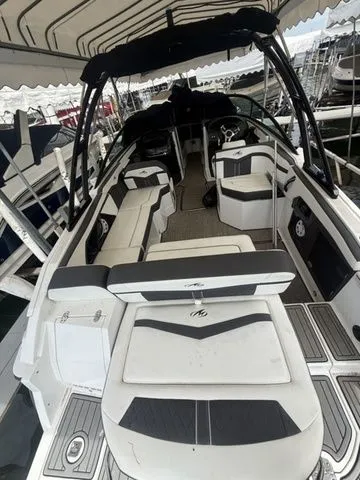 Slide: The Image of Interior view of a 2019 Monterey 258SS Super Sport boat at the dock. - 14