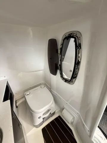 Slide: The Image of Interior of 2019 Monterey 258SS Super Sport with toilet and window. - 4