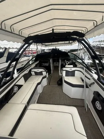 Slide: The Image of Interior view of a 2019 Monterey 258SS Super Sport boat under a canopy. - 9