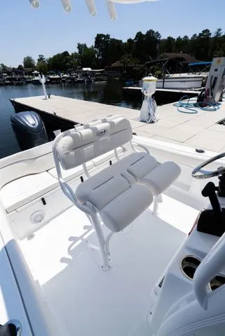 Slide: The Image of Interior of a 2026 Sea Hunt Ultra 219 boat at the dock. - 4