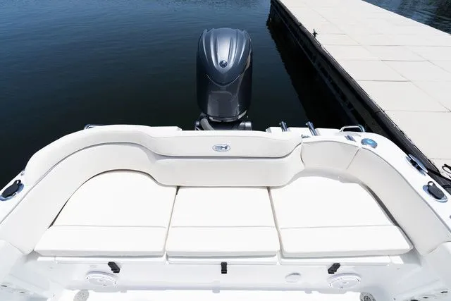 Slide: The Image of Rear view of Sea Hunt Ultra 219 boat, 2026 model, at dock. - 6