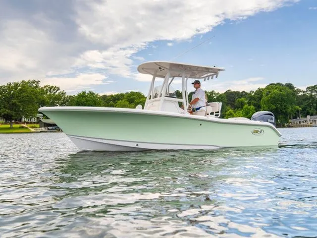 The Image of 2026 Sea Hunt Ultra 219 boat on calm water. - 1