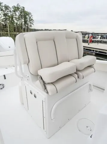 Slide: The Image of 2026 Sea Hunt Ultra 245 SE boat seat with cushioned design. - 7