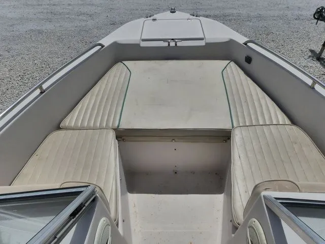 Slide: The Image of Interior view of a 1998 Scout 172 Dorado boat with seating area. - 15
