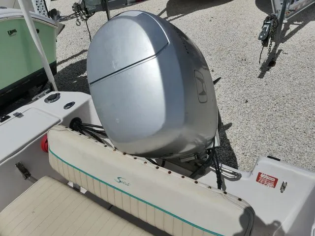 Slide: The Image of 1998 Scout 172 Dorado with outboard motor and seating. - 6