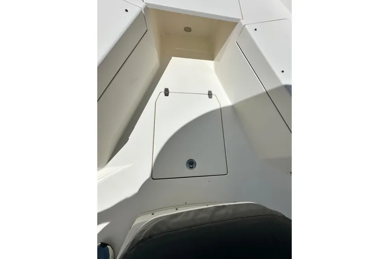 Slide: The Image of 2021 Cobia 240 Center Console boat interior storage compartment. - 10