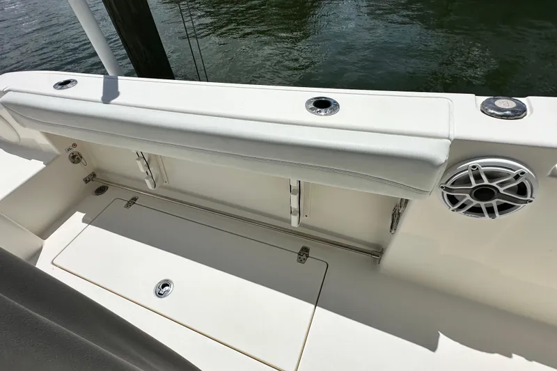 Slide: The Image of 2021 Cobia 240 Center Console boat interior with seating and speaker detail. - 39