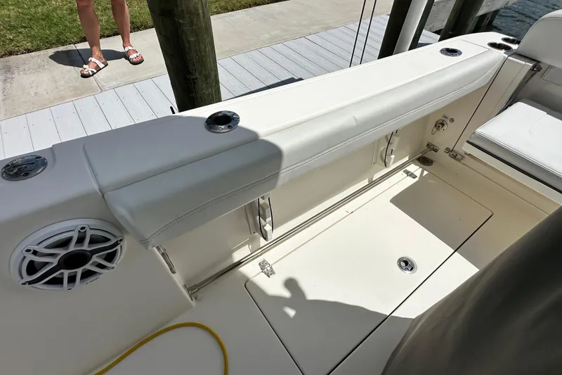 Slide: The Image of 2021 Cobia 240 Center Console boat interior with seating and speaker detail. - 40