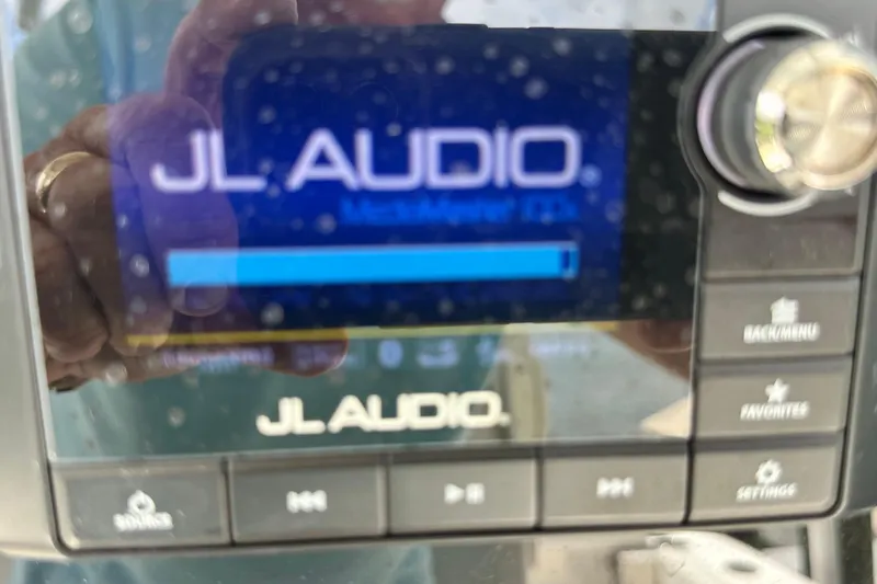Slide: The Image of JL Audio MediaMaster display on 2021 Cobia 240 Center Console boat. - 70