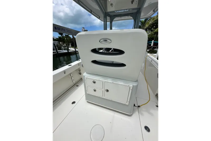 Slide: The Image of 2021 Cobia 240 Center Console boat interior with storage compartments. - 82