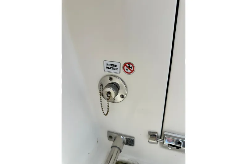 Slide: The Image of Fresh water inlet on 2021 Cobia 240 Center Console boat. - 92