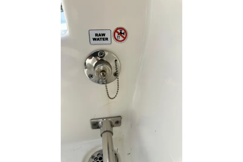 Slide: The Image of Raw water inlet on 2021 Cobia 240 Center Console boat. - 93