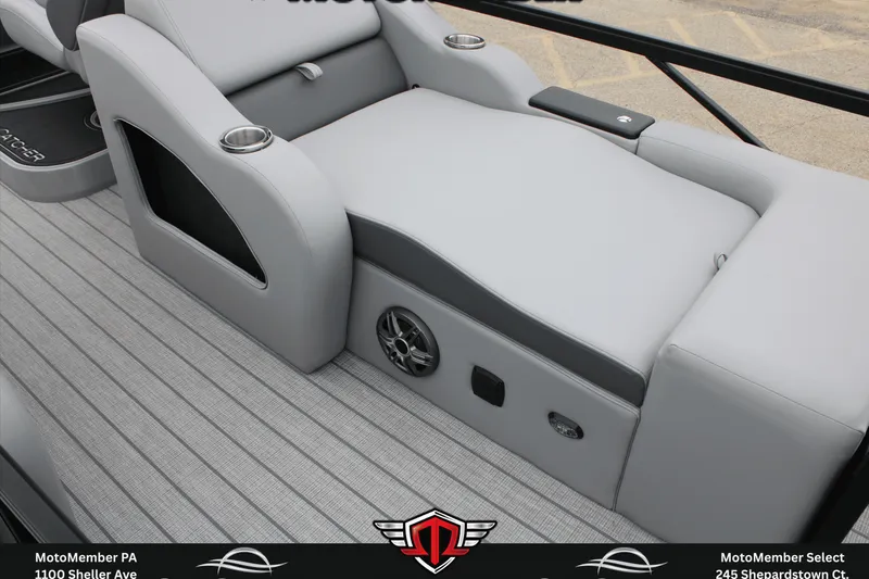 Slide: The Image of Luxurious seating on 2026 SunCatcher Fusion 324SS boat with cup holders and speaker system. - 12