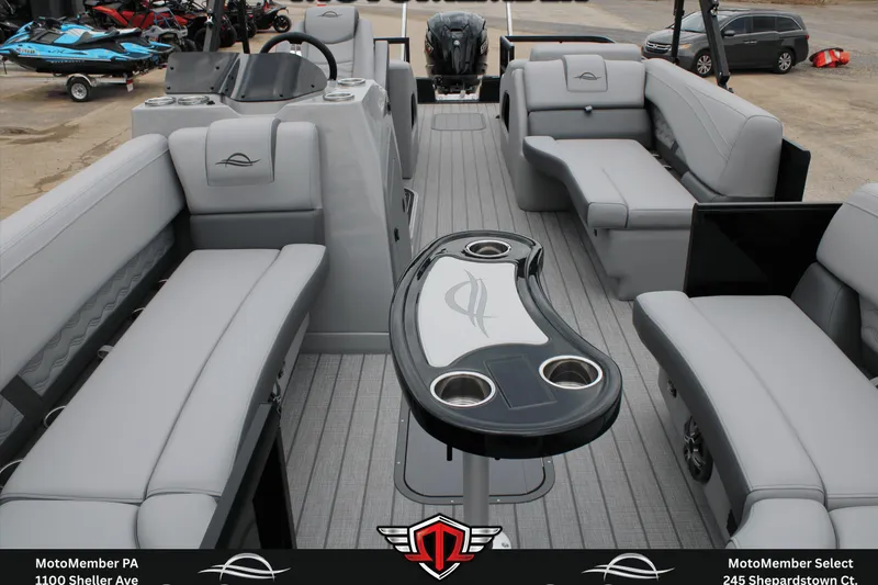 Slide: The Image of 2026 SunCatcher Fusion 324SS pontoon boat interior with sleek seating and modern design. - 13