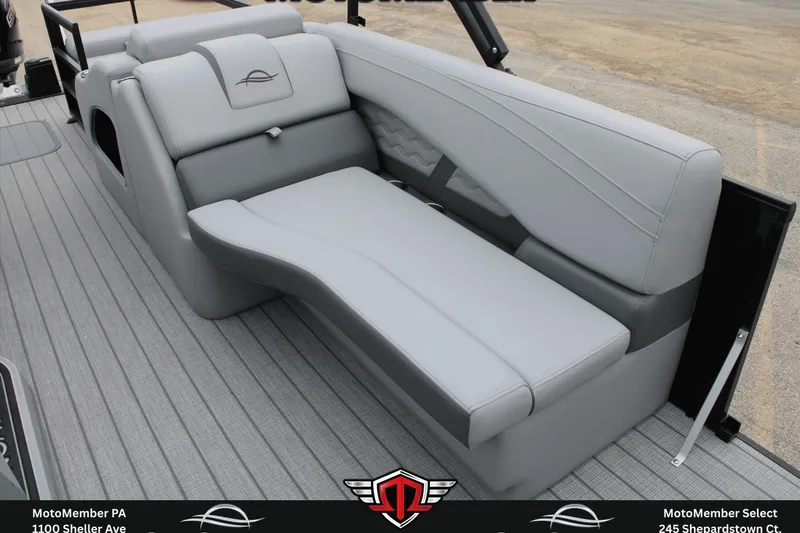 Slide: The Image of 2026 SunCatcher Fusion 324SS boat interior with sleek gray seating and modern design. - 14