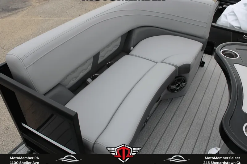 Slide: The Image of Luxurious seating on 2026 SunCatcher Fusion 324SS boat, featuring sleek gray upholstery. - 16
