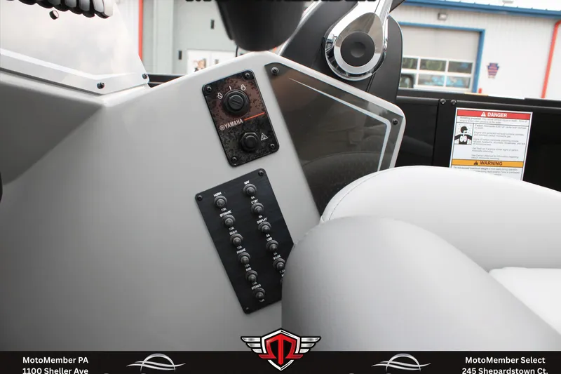 Slide: The Image of Control panel of 2026 SunCatcher Fusion 324SS boat with Yamaha controls. - 21