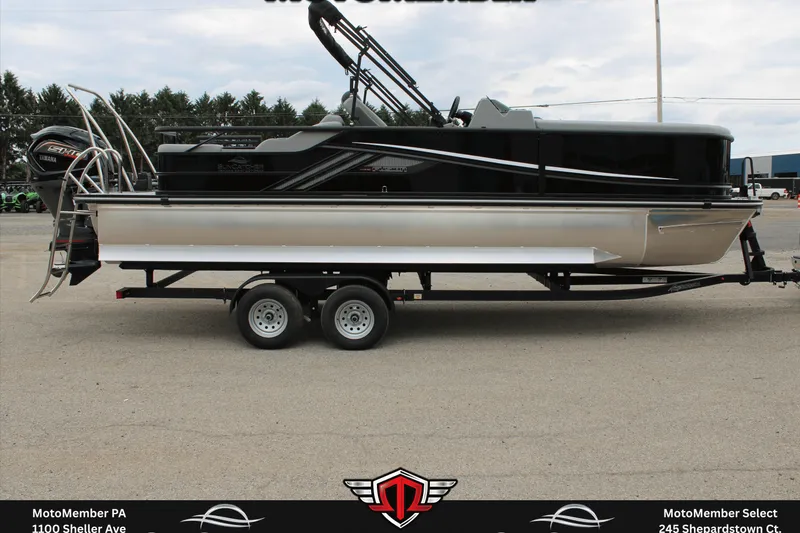 Slide: The Image of 2026 SunCatcher Fusion 324SS pontoon boat on trailer, side view, outdoors. - 3