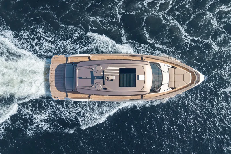 Slide: The Image of Aerial view of 2025 Azimut Seadeck 6 yacht cruising on open water. - 18