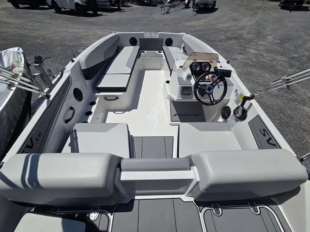 Slide: The Image of Interior view of Starcraft 2025 SV 16 OB boat with helm console. - 10