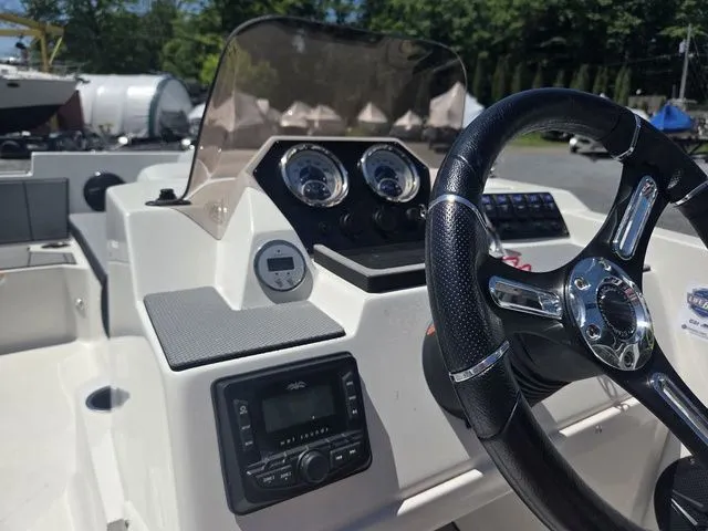 Slide: The Image of Dashboard of a 2025 Starcraft 2025 SV 16 OB boat. - 18