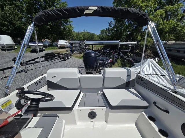 Slide: The Image of Interior view of a Starcraft 2025 SV 16 OB boat with 90Hp engine. - 21