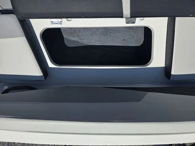 Slide: The Image of Interior view of Starcraft 2025 SV 16 OB boat, storage compartment visible. - 27