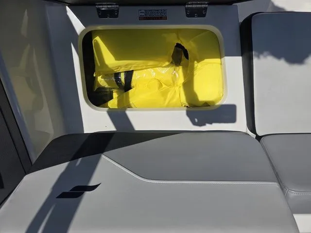 Slide: The Image of Storage compartment in Starcraft 2025 SV 16 OB boat with yellow bag. - 29