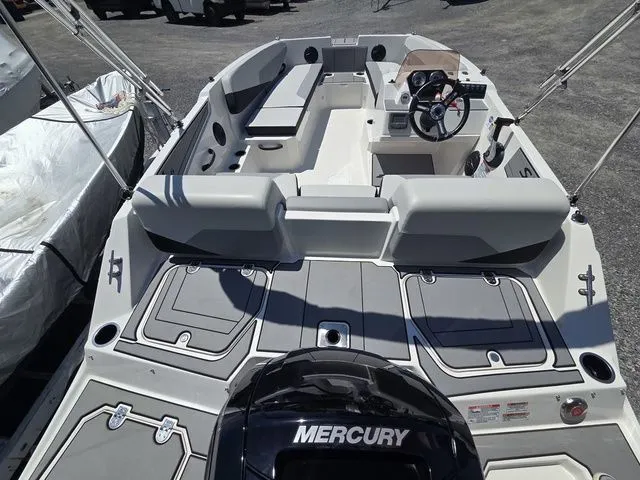 Slide: The Image of Starcraft 2025 SV 16 OB boat with 90Hp and trailer, interior view. - 9