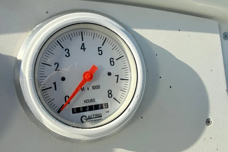 Slide: The Image of Close-up of a Gaffrig tachometer on a 1999 Formula 312 FASTech boat. - 13