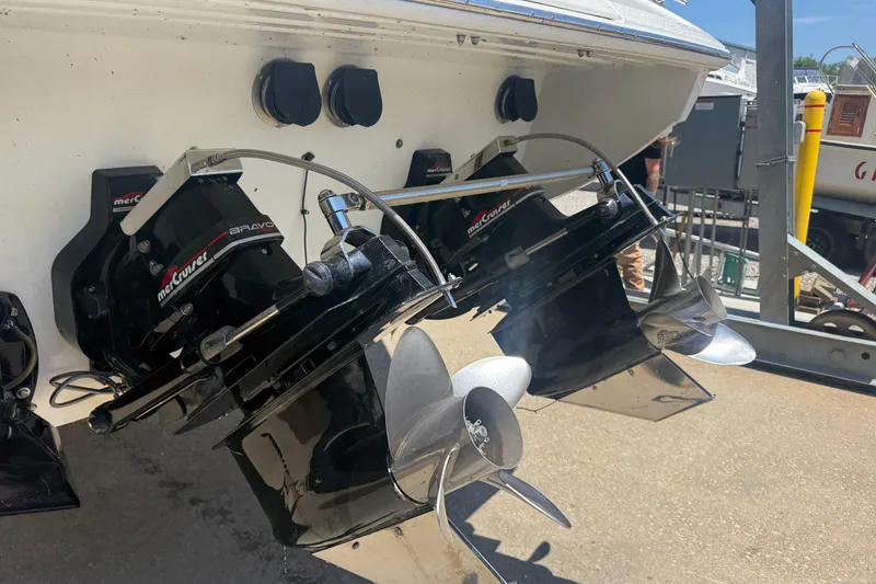 Slide: The Image of 1999 Formula 312 FASTech boat with dual MerCruiser Bravo outdrives and stainless steel propellers. - 24