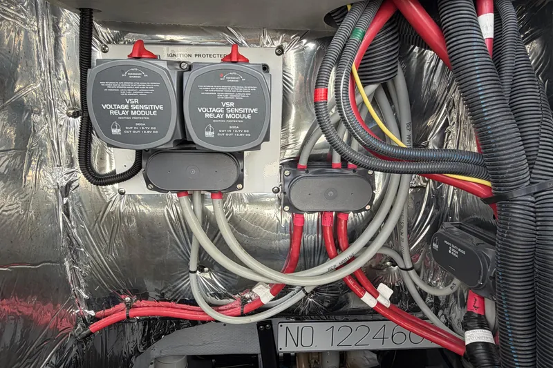 Slide: The Image of Electrical wiring and relay modules in a 2005 Meridian 411 Sedan boat. - 27