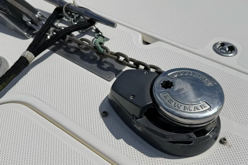 Slide: The Image of Anchor windlass on 2005 Meridian 411 Sedan boat deck. - 28