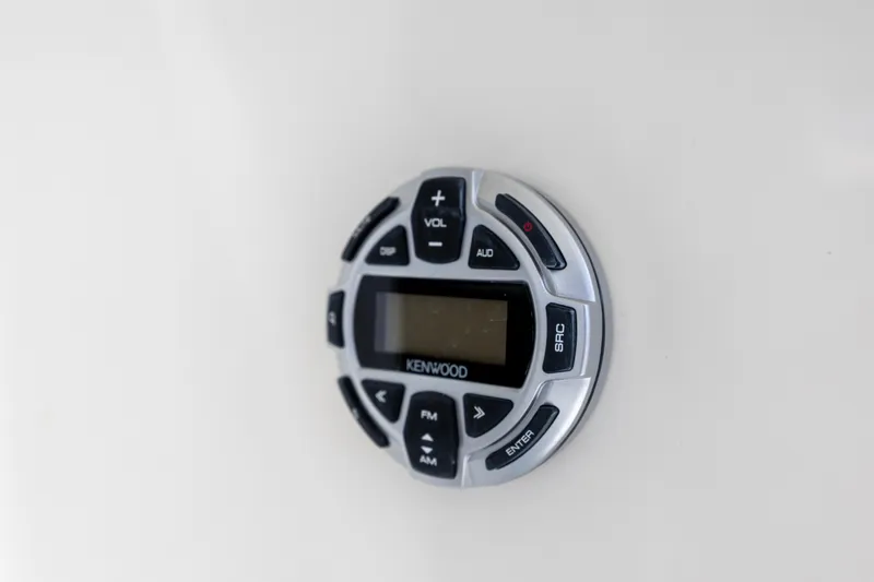 Slide: The Image of Kenwood audio control panel on 2005 Meridian 411 Sedan yacht interior. - 29