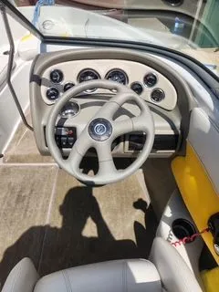 Slide: The Image of Interior view of a 2012 Crownline 18 SS boat cockpit. - 15