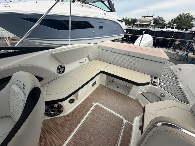 Slide: The Image of Interior view of a Sea Ray SPX 230 Outboard with sleek seating and modern design. - 20