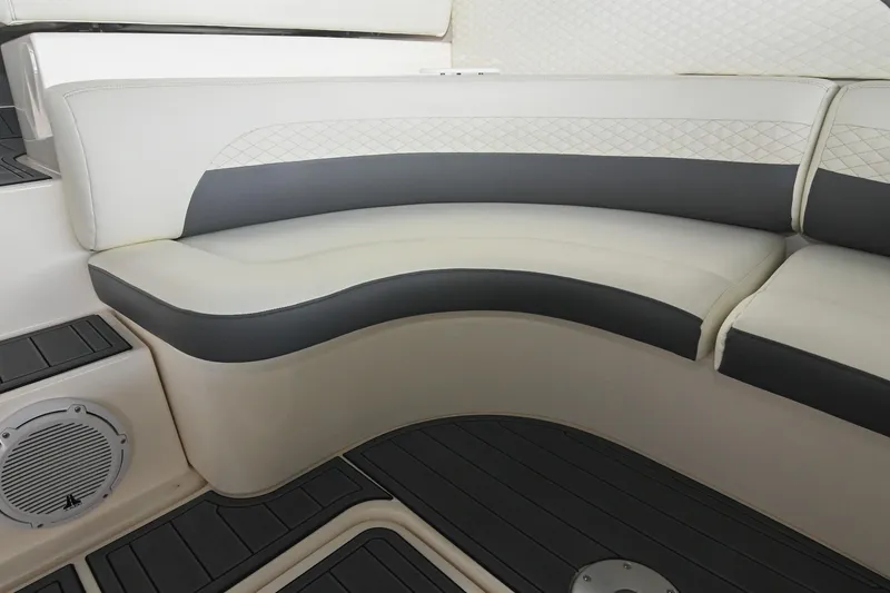 Slide: The Image of 2005 Cruisers Yachts 370 Express interior seating with elegant white and gray upholstery. - 24