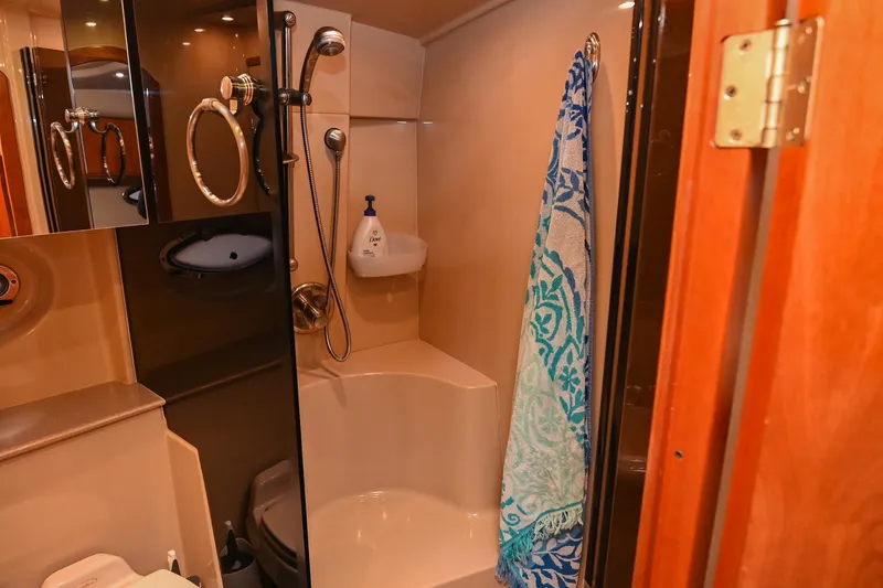 Slide: The Image of Bathroom interior of 2005 Cruisers Yachts 370 Express with shower and towel. - 45
