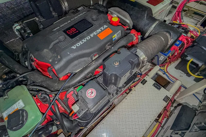 Slide: The Image of Engine compartment of a 2005 Cruisers Yachts 370 Express with Volvo Penta engine. - 68