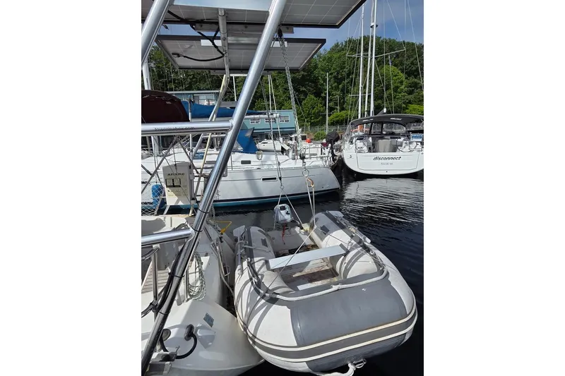 Slide: The Image of Dinghy w/ Honda outboard on davit system - 18