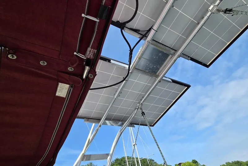 Slide: The Image of Solar panels mounted on a Tower in a Box davit system - 22