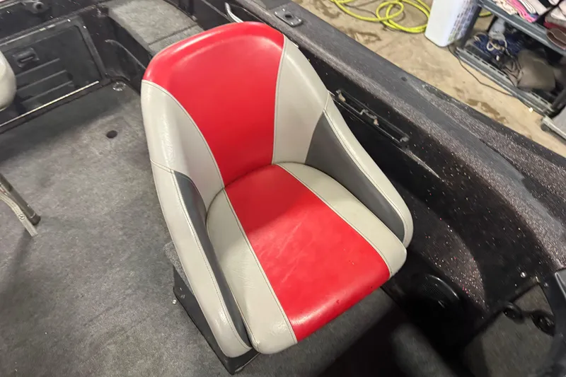 Slide: The Image of Red and gray seat in 2002 Tracker Targa 2000 boat interior. - 8