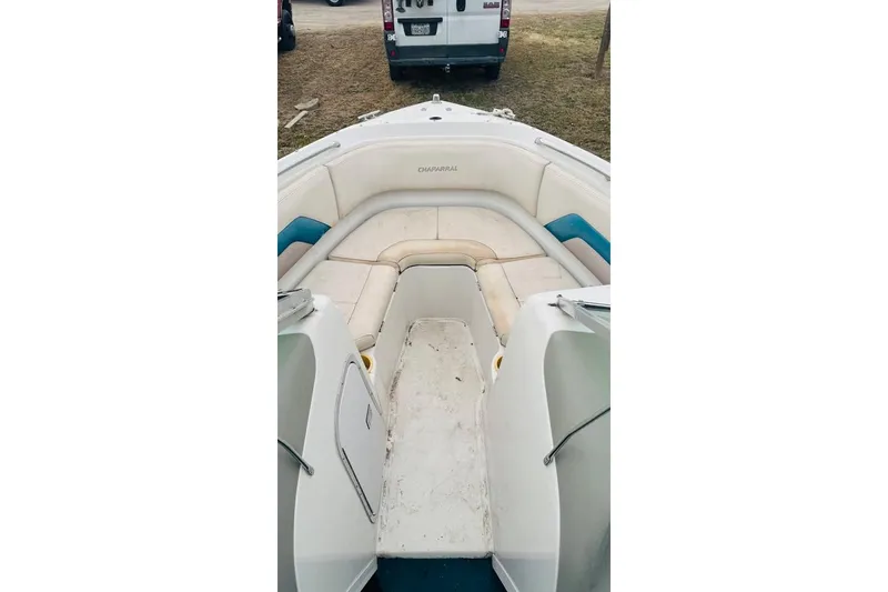 Slide: The Image of Interior view of a 1994 Chaparral 1930 SS boat with white seating. - 13
